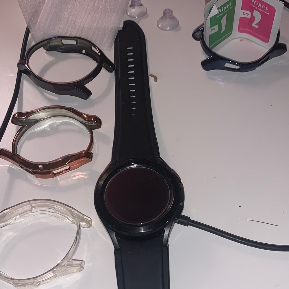 Samsung Black Smartwatch with Multiple Bands
